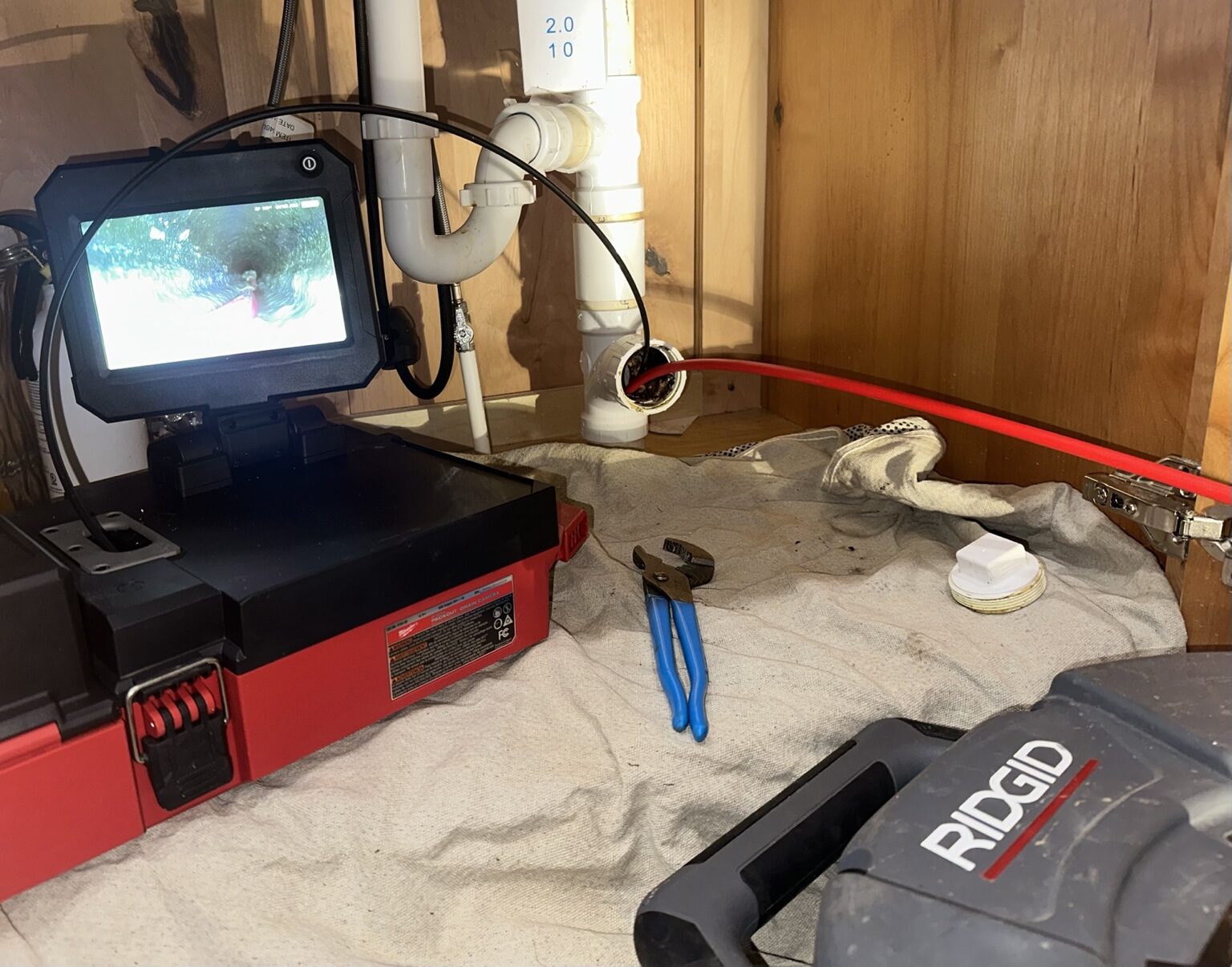 Scooters drain camera inspecting a kitchen drain line